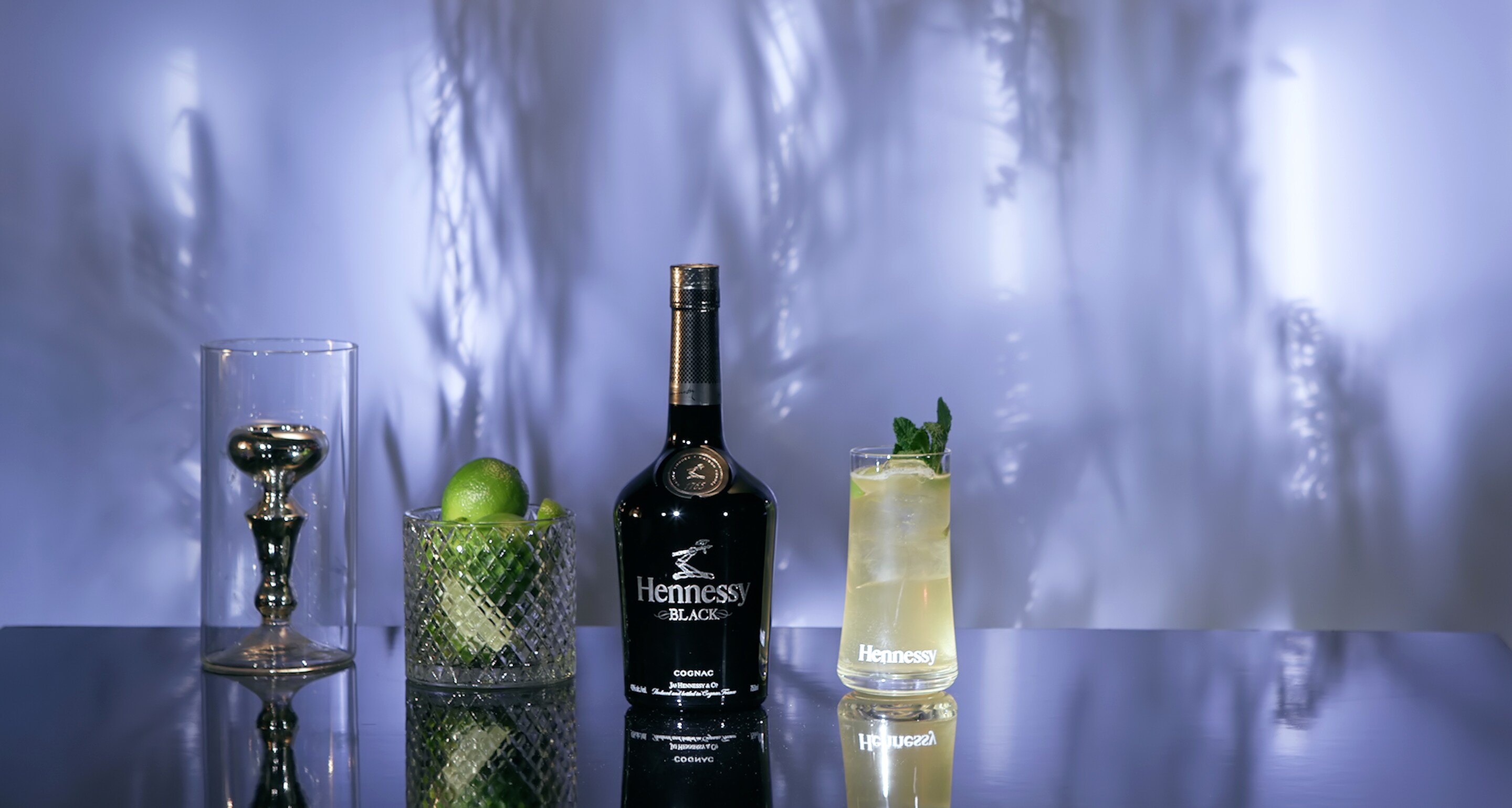 Summer cocktail with ginger ale and cognac Black Spice Hennessy